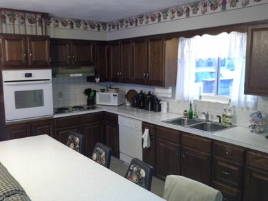 View from family room into work area of kitchen.