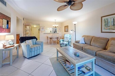 Living room featuring light tile patterned floorin