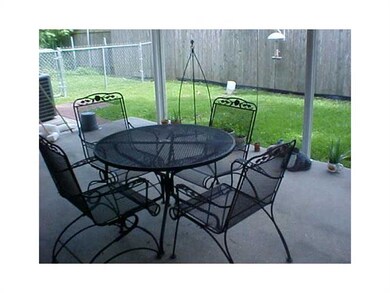Patio/Deck. Covered patio and yard on 4710 side