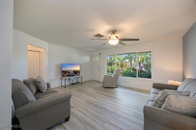 Living room impact windows and luxury vinyl floori