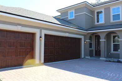 Stylish garage door entry