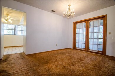 Dining room, leading out to porch.