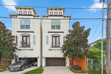 This is a modern, multi-story duplex with a light