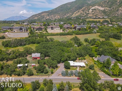 Birds eye view of property featuring a mountain view