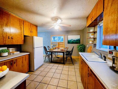 Virtually staged kitchen and eating area