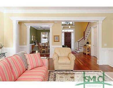 Living Room. The living room has brazillian cherry