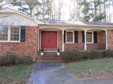 Solid wood double door entry to foyer