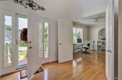 Beautiful hardwood floors upon entering the home.