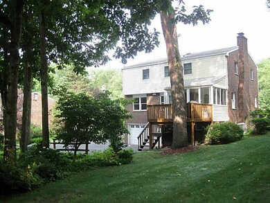 Exterior Back. Lush mature landscaping