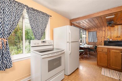 The kitchen opens to the dining area.