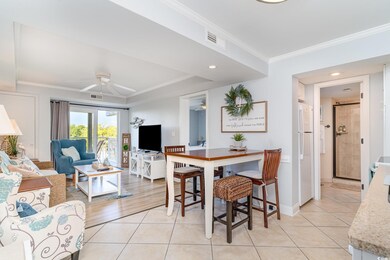 Dining area featuring light tile patterned floorin