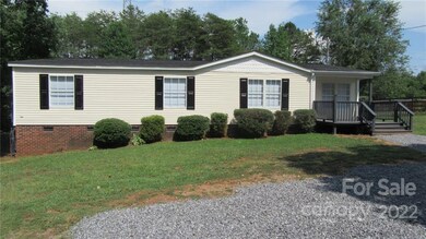 127 Lamb Rd Statesville NC 28677 Front of home. Fresh gravel on entire driveway.