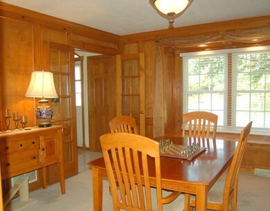 Dining Room. French doors, large windows and gleam