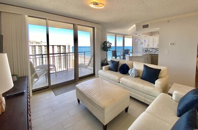 Tiled living room with a wealth of natural light, 