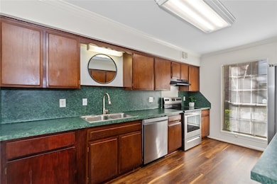 Tons of cabinets and amazing counterspace makes th