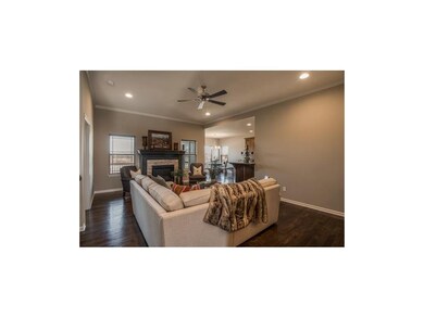 The living room has 10' ceilings, hardwood floors 