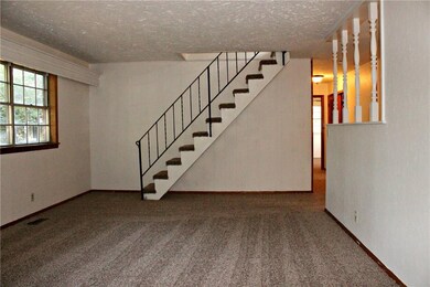 Living Room
Stairs leading up to the 3rd Bedro