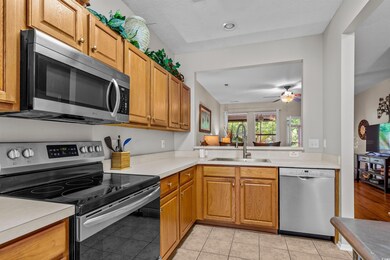 Kitchen with stainless steel appliances, a sink, a