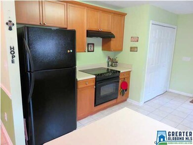 Laundry closet at the back of the kitchen is conve