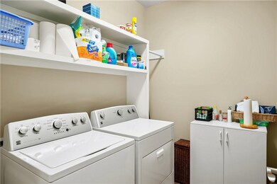 Spacious laundry in hallway, washer & dryer includ