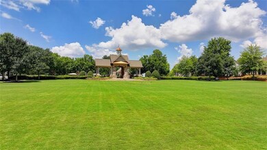 View of grassy yard featuring a gazebo