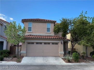 Mediterranean / spanish house featuring an attache