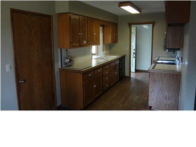 KITCHEN HAS WINDOW OVER SINK FOR OUTDOOR VIEW