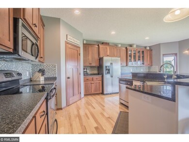 Kitchen with walk-in pantry, recessed and pendant 