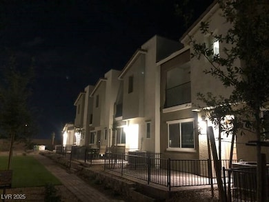 View of property at twilight