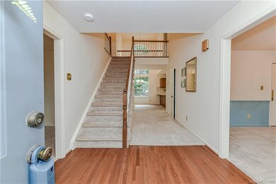 Large oak floored entry - living room (new carpet)