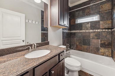 Impeccable 2nd bath down with custom slate tile tu