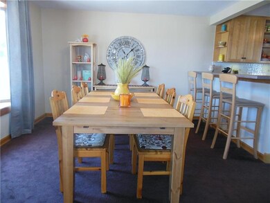 The formal dining room has a large bay window and 