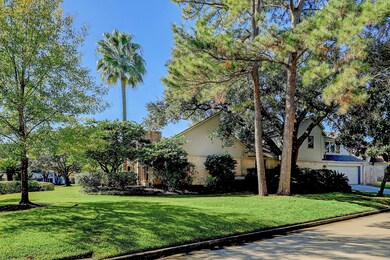 Side yard with additional driveway parking off gar