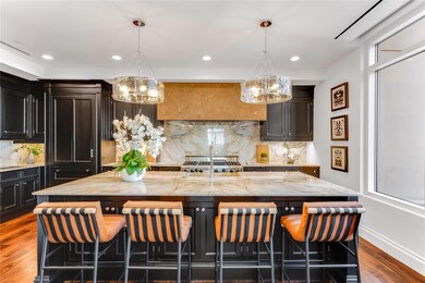 Kitchen with dark hardwood / wood-style flooring, 