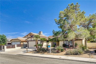 View of front of home featuring stucco siding, con