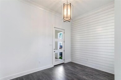 Beautiful entryway with lots of daylight and Butt