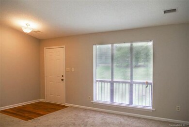 Family room looks out onto the front porch.  New C