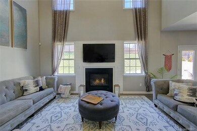 Fireplace features custom mantel and shiplap accen