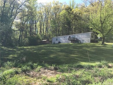 View from the road, approaching the home
