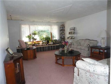 Living Room. Hardwood floors under carpet as per o
