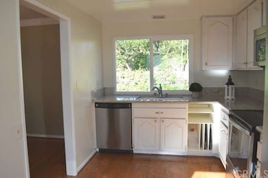 Updated kitchen with stainless steel appliances, l