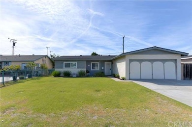 It all starts with this massive front lawn and nice curb appeal. Two car garage and a nice little sitting porch and front planter.