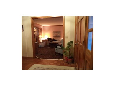 Entry, looking into formal living room.