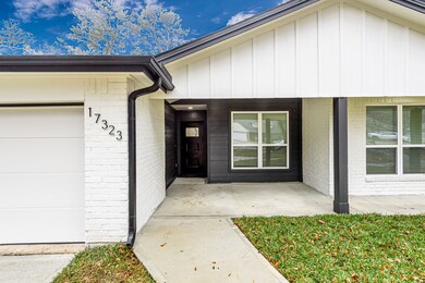 A thoughtfully designed entryway with charming cur