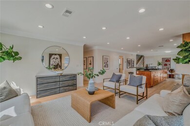 Living Room area looking towards the centrally located kitchen and dining area