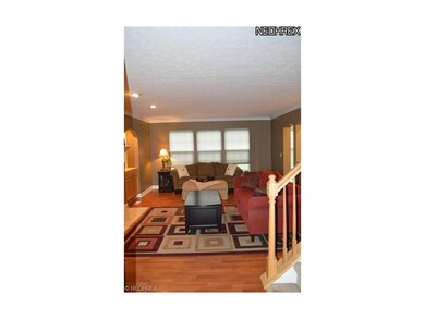 Third view of spacious living room.