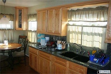 Kitchen with granite counter tops and new cabinets