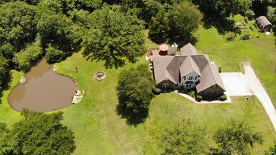 Three acres, more or less, with; pond, firepit, de