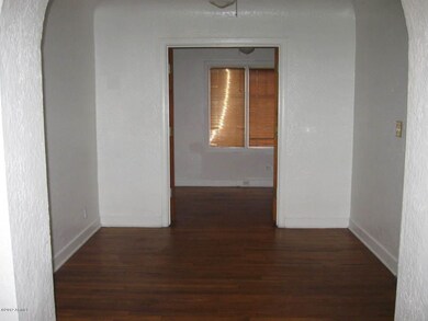 Enter the den through the Dining room