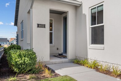 Entrance to property featuring stucco siding